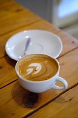 hot latte coffee put on table