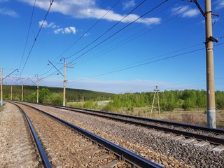Fototapeta na wymiar Railway under the blue sky