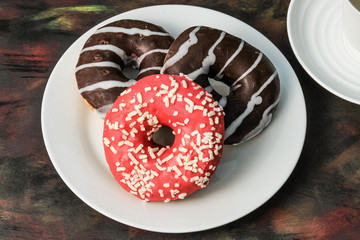 various flavors of donuts on the table