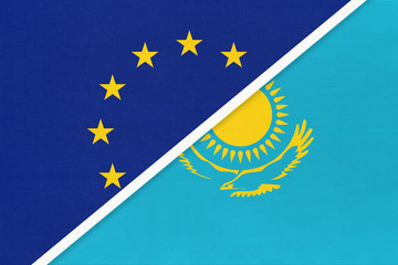 European Union or EU and Kazakhstan national flag from textile. Symbol of the Council of Europe association.