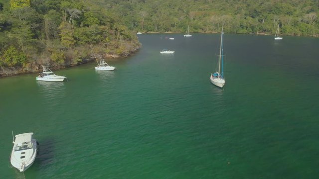 Yachts anchored at the famous weekend spot of yacht parties at Scotland Bay, Trinidad