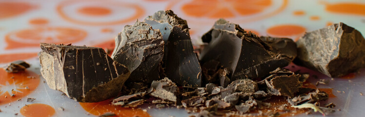 Broken pieces of dark bitter chocolate