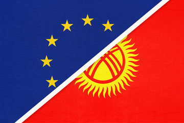 European Union or EU and Kyrgyzstan national flag from textile. Symbol of the Council of Europe association.