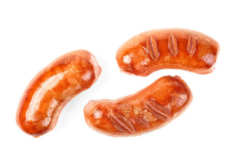 Grilled sausages isolated on a white background. Fried meat sausages.