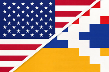 USA and Artsakh national flag from textile. Relationship between two american and asian countries.