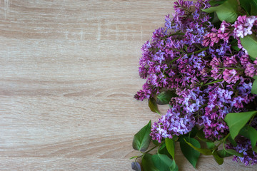 Still life, lilac on the table, background