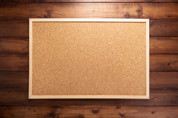 cork board on wooden background - 350465465