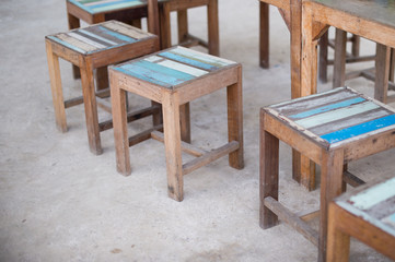 Fototapeta na wymiar closeup of grunge wood stool furniture.