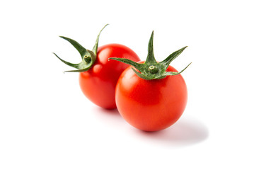 Red ripe tomato isolated on white background - fresh tomato healthy vegetable concept