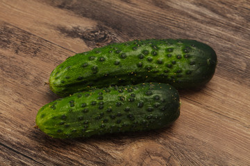 Ripe fresh green two cucumbers