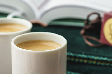 Oriental religious beads close up on a wooden table with coffee