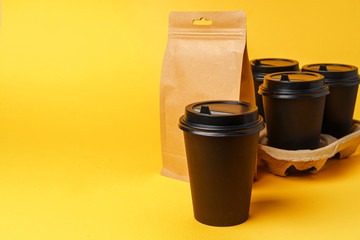 Takeaway food concept. Some packed food in container with coffee cup on table