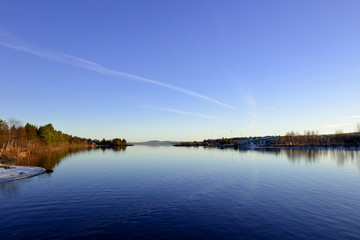 Lake Inari with clear blue sky in Finland