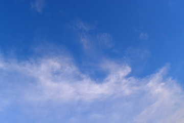 Naklejka na ściany i meble Sky blue background. Natural background.The sky with clouds and sunlight