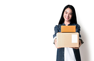 Fototapeta na wymiar Delivery woman holding cardboard boxes. Online shopping concept