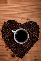 Black coffee with coffee beans