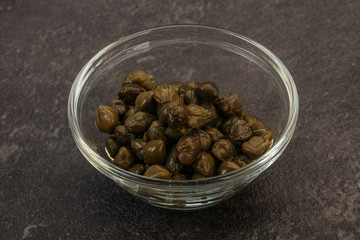 Tasty capers in the bowl