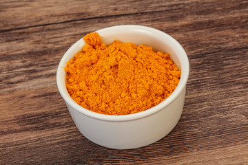 Tumeric powder in the bowl