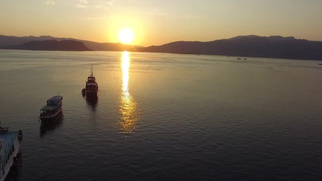 sunset and the boat on labuan bajo 