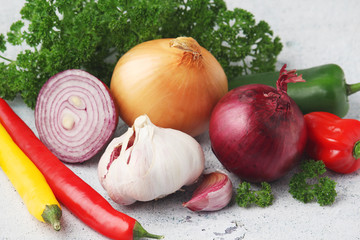 Different spices: onion. garlic, parsley and pepper