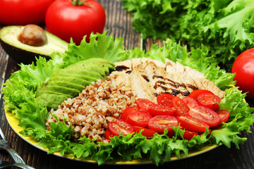 Turkey breast, avocado, salad and buckwheat as healthy lunch