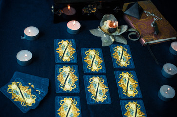 Mystical atmosphere, view of tarot card on the table, esoteric concept, fortune telling and predictions