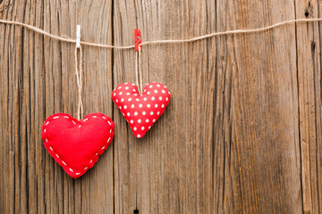 Valentines day ornaments on wooden background