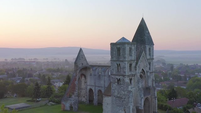 Amazing aerial 4k vedeo about the Premontre Monastery. This is a church ruin in Zsambek city Hungary. Built in 1220-1234.  Roman and gotchic style. Destroyed an big earthquake in 1763. 