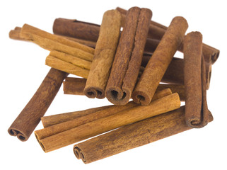 Cinnamon sticks isolated on a white background close-up.