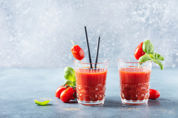 Vegan tomato juice with basil and peppe