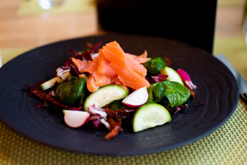 Salmon Salad spinach, cherry tomatoes, baby spinach