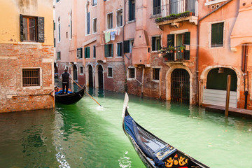 Fototapeta na wymiar Gondola boats on the Canals of Venice, Italy
