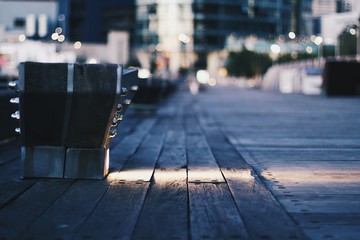 Isolated floor light illuminating timber wood floor at the pier