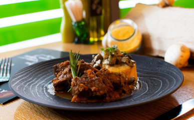Ossobuco or osso buco veal shanks with vegetables