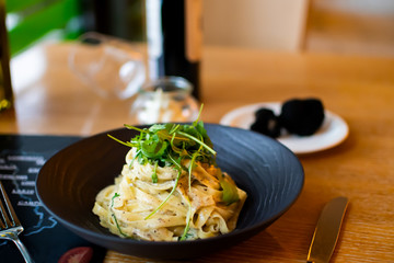 Traditional tagliatelle pasta black truffle mushroom