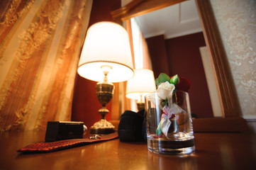 The groom is gathering in the morning. Men's classic patent leather shoes. Wedding details. Eau de toilette, perfume, watch.