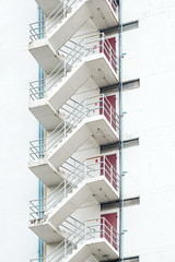 Fire escape, stairway on the side of the white building