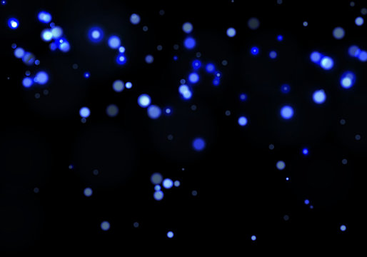 Blue bokeh light background. Sparkle effect with particles. Magic overlay dust. Glitter blur texture.