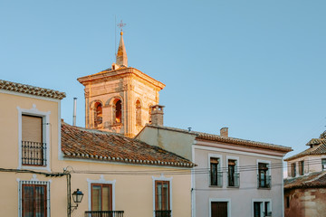 Dome of the church between the roofs of the houses