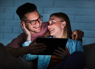 couple movie night tc laptop tablet  love watching entertainment