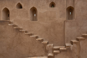 Opposing stairs in clay or mud Jibreen Castle, Oman
