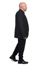 man with blazer walking on white background