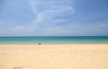 Fototapeta na wymiar Beautiful tropical beach, white sand and turquoise water with blue sky.