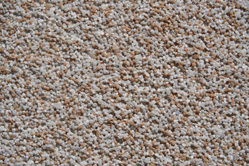 close view of the wall surface, decorative finishing, heat insulation granules or granite particles