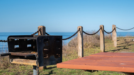 fence and rope in front of a coastline of San Luis obispo
