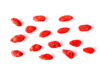 Wallpaper spices and herbs with dried goji berries isolated on white background.