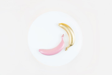 Obraz na płótnie Canvas Three bananas on a background. 