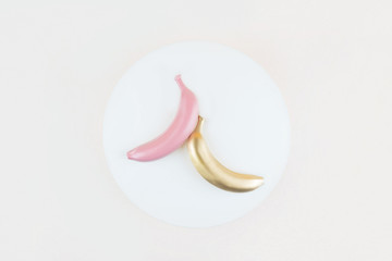 Obraz na płótnie Canvas Three bananas on a background. 
