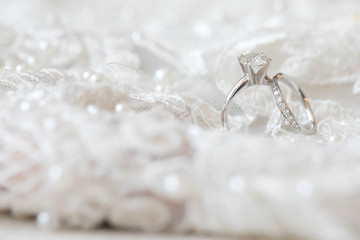 Beautiful and luxury wedding ring for bride and groom that have lots of small diamond on it.