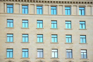 Fototapeta premium Symmetrical Windows on a Building Facade in Barcelona, Spain